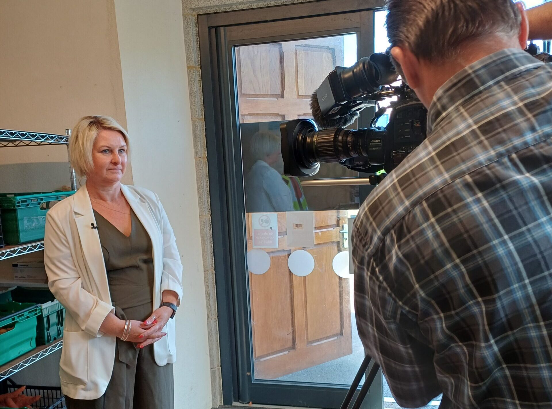 woman being interviewed on camera